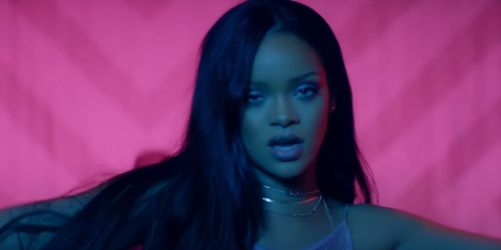 Rihanna singing in her Work music video
