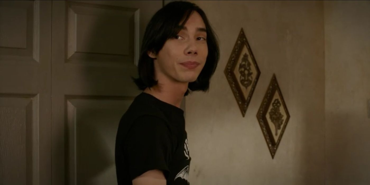 Rodrick (Charlie Wright) smiling over his shoulder in Diary of a Wimpy Kid The Long Haul.