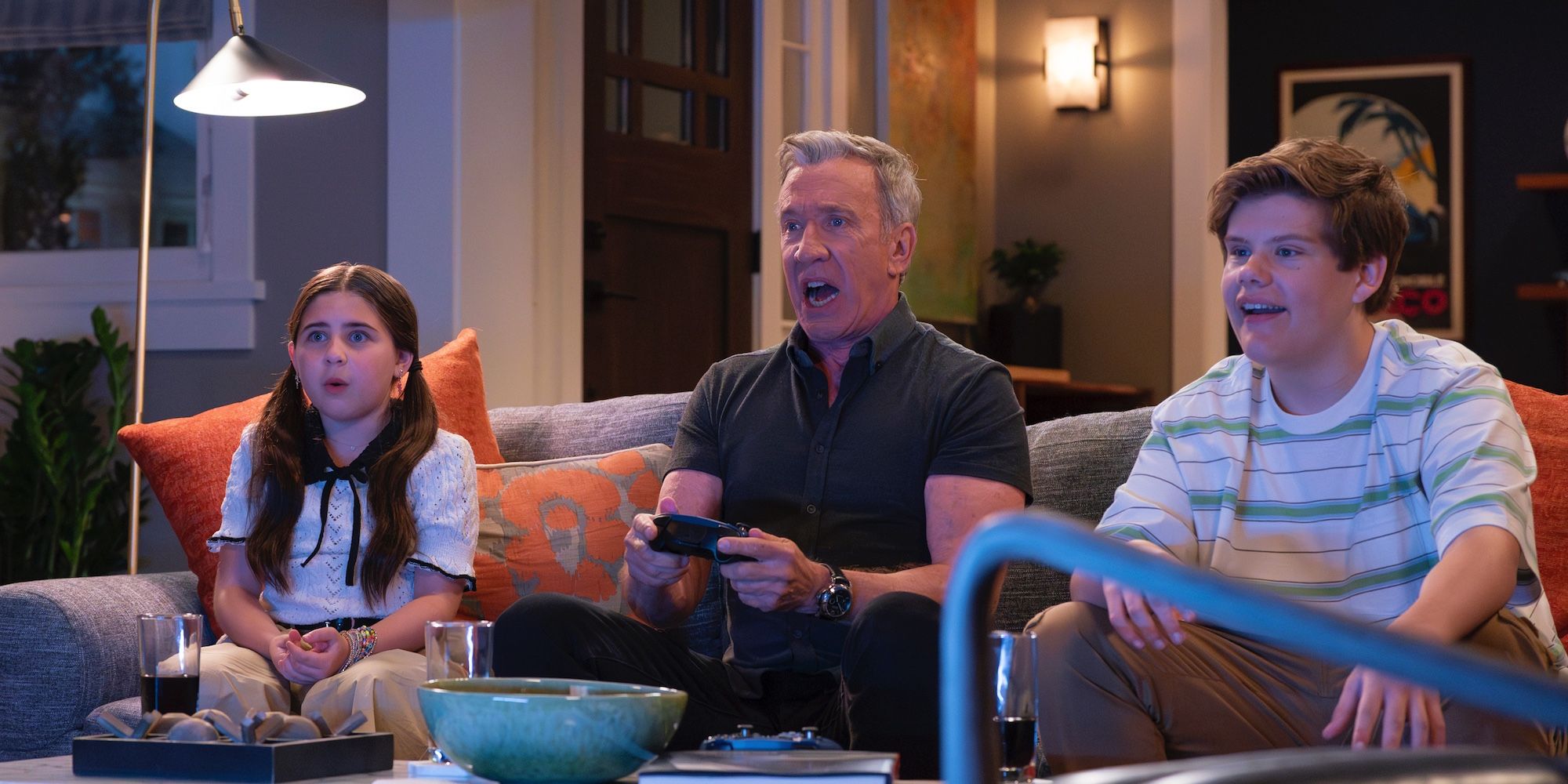 Georgia (Barrett Margolis), Matt (Tim Allen), and Carter (Maxwell Simkins) playing video games in Shifting Gears.