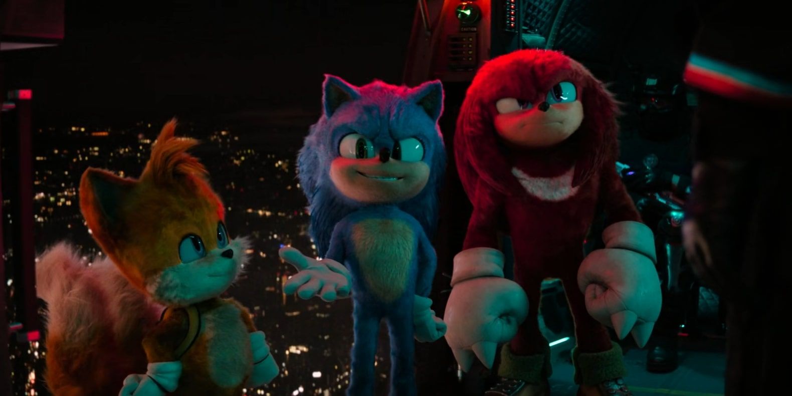 Team Sonic (Sonic, Knuckles and Tails) standing on the edge of a helicopter in Sonic the Hedgehog 3