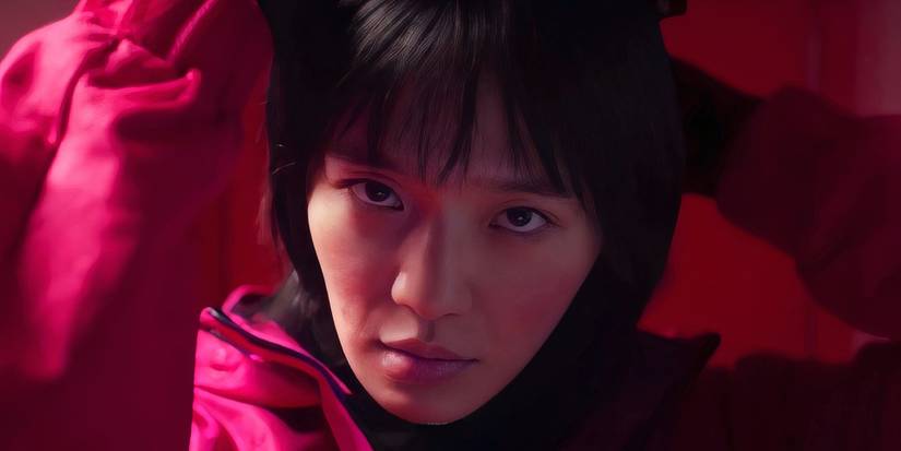 An edited image of No-eul putting her mask on in Squid Game season 2.