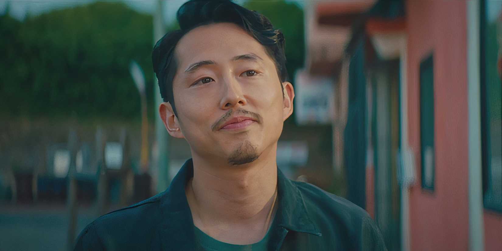 Steven Yeun as Squeeze smiling in Sorry to Bother You