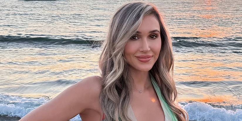 The Bachelor Season 29 Contestant Dina Lupancu Posing On A Beach