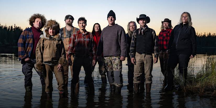 The cast of Alone season 10 posing in the wilderness