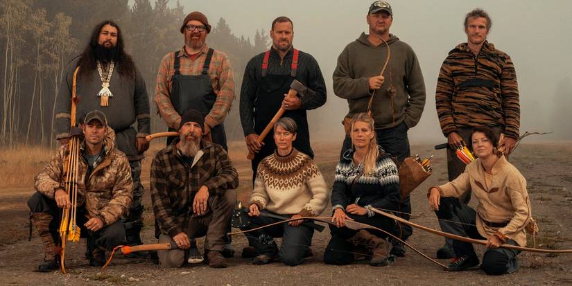 The cast of Alone season 8 posing with weapons