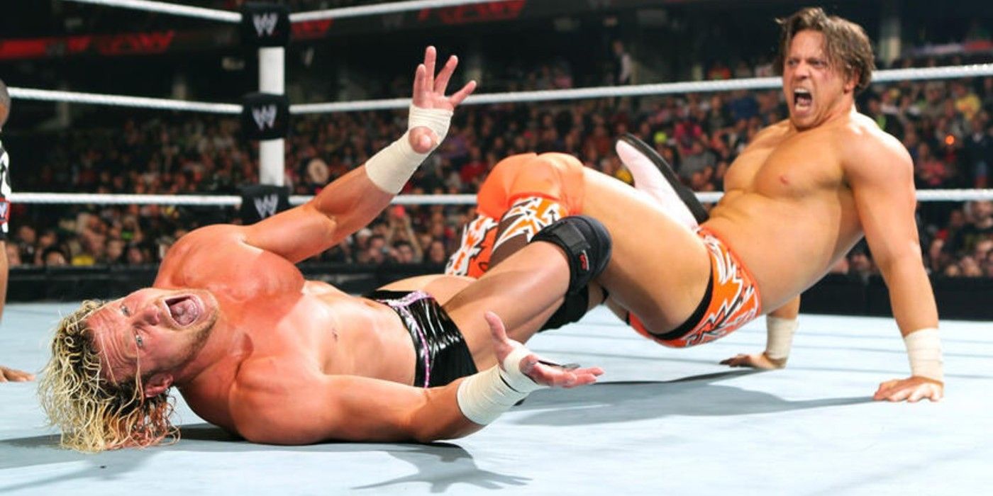 The Miz applies Figure Four legs to Dolph Ziggler on a WWE ring