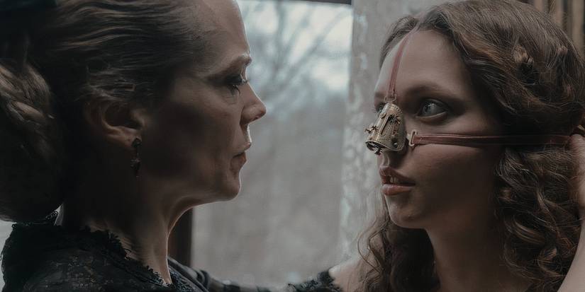 Lea Myren as Elvira being fitted with a device over her nose in The Ugly Stepsister