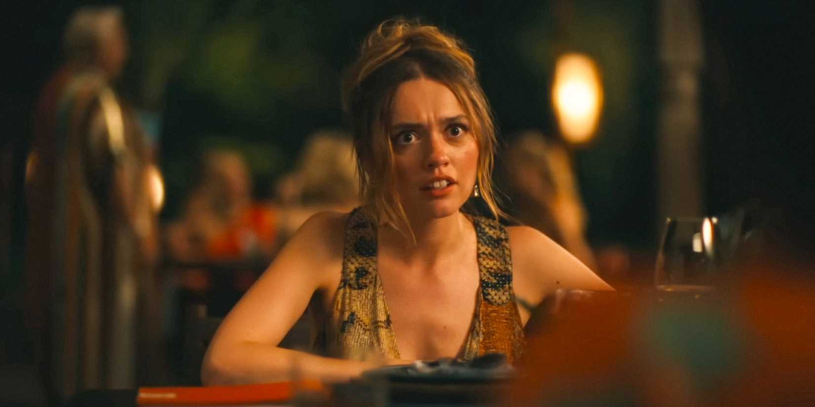 Aimee Lou Wood looking at someone in offended surprise in White Lotus season 3