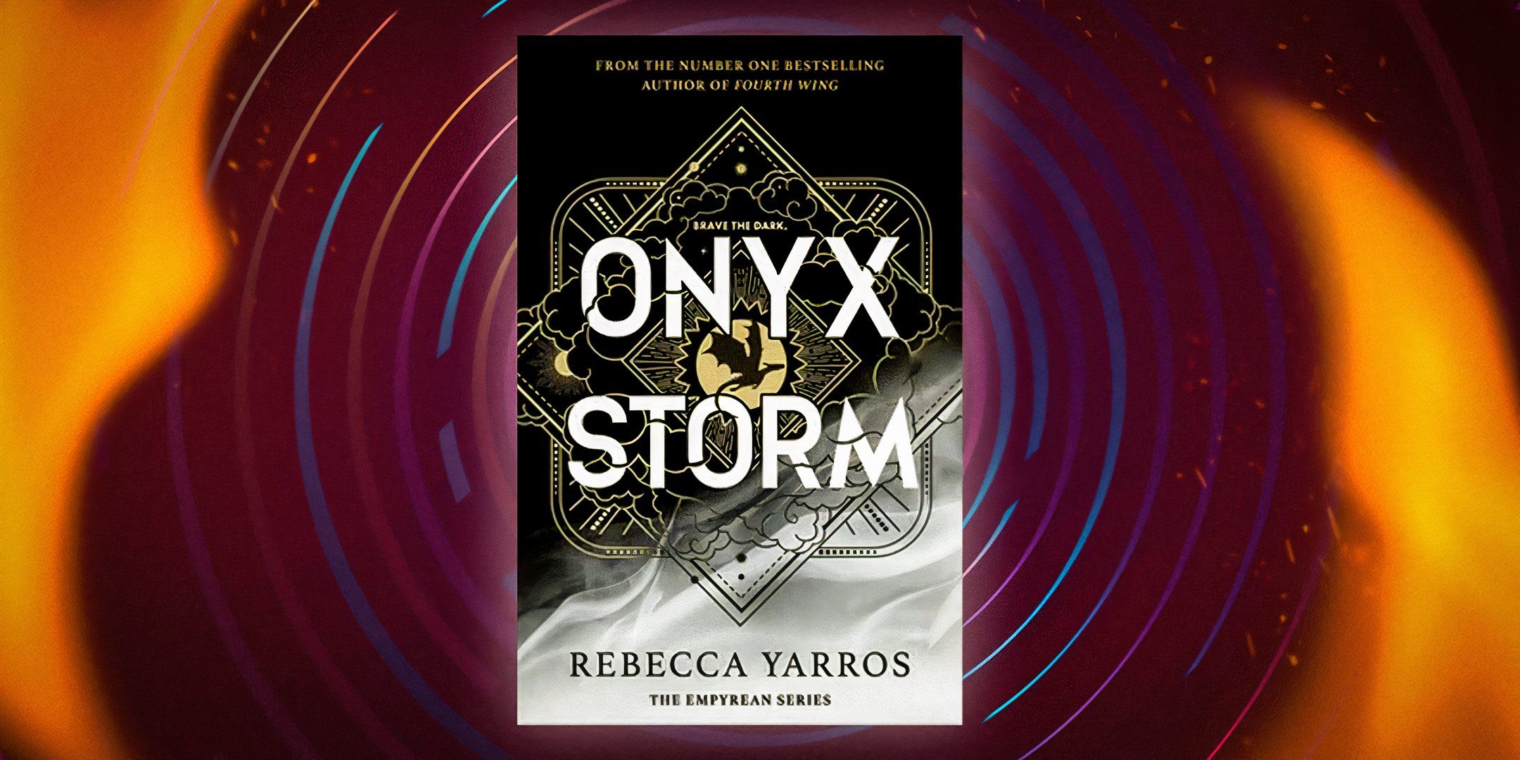 The cover of Onyx Storm on a maroon and orange background