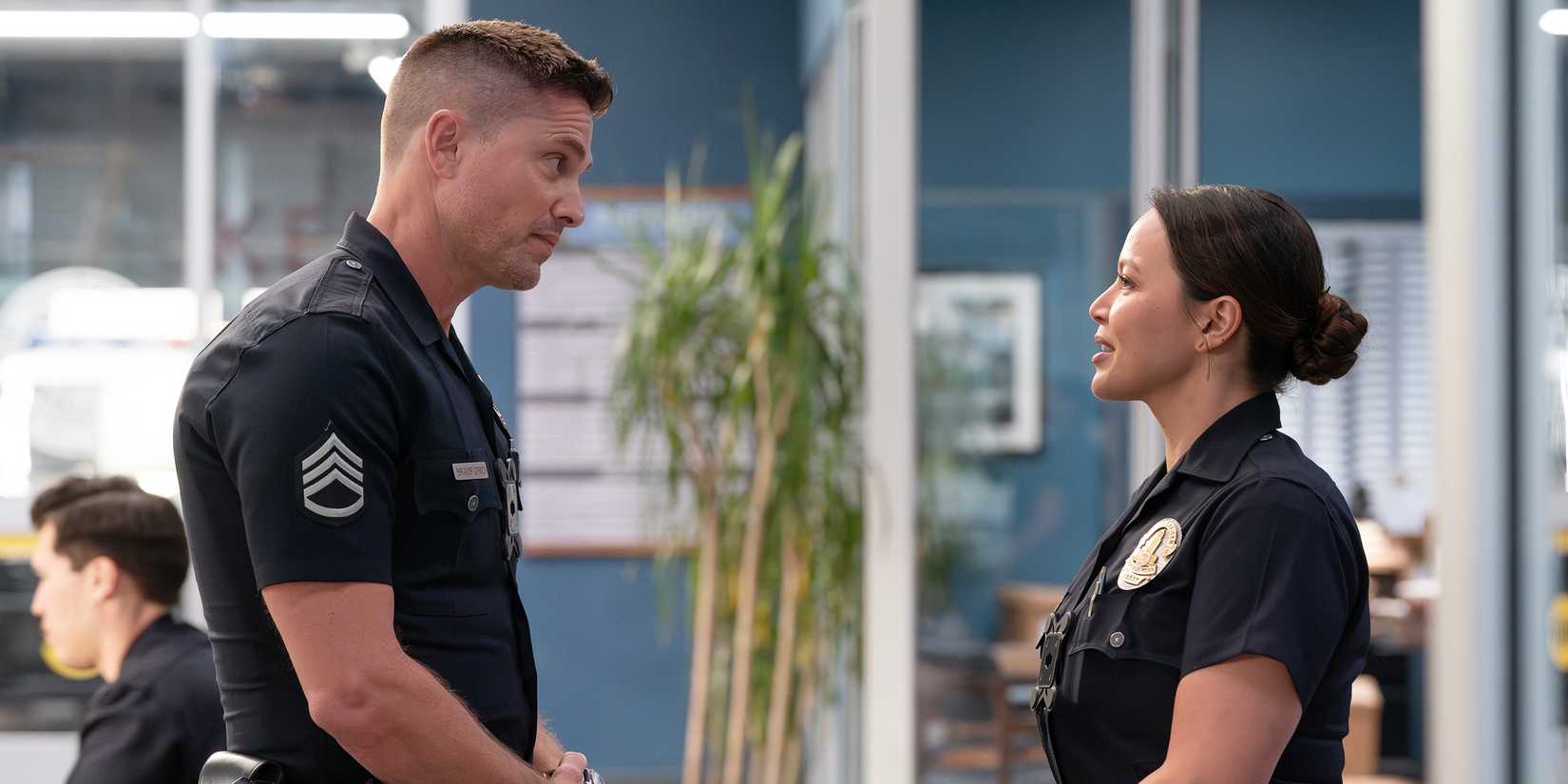 Tim and Lucy smiling at each other in The Rookie season 7, episode 1