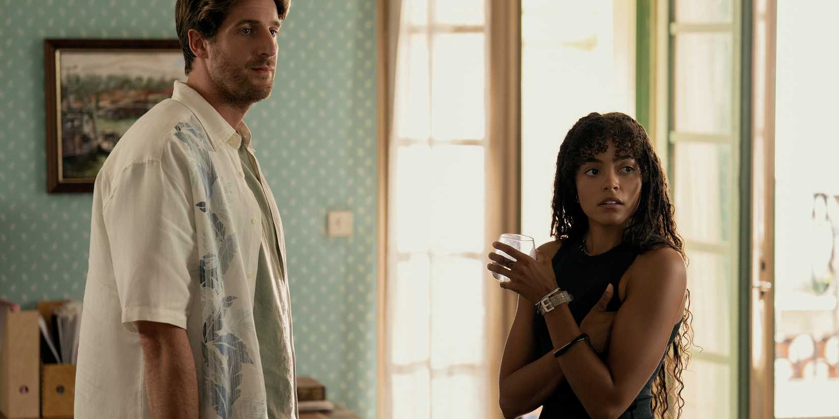 Tom Stourton & Quintessa Swindell standing in a living room in Prime Target