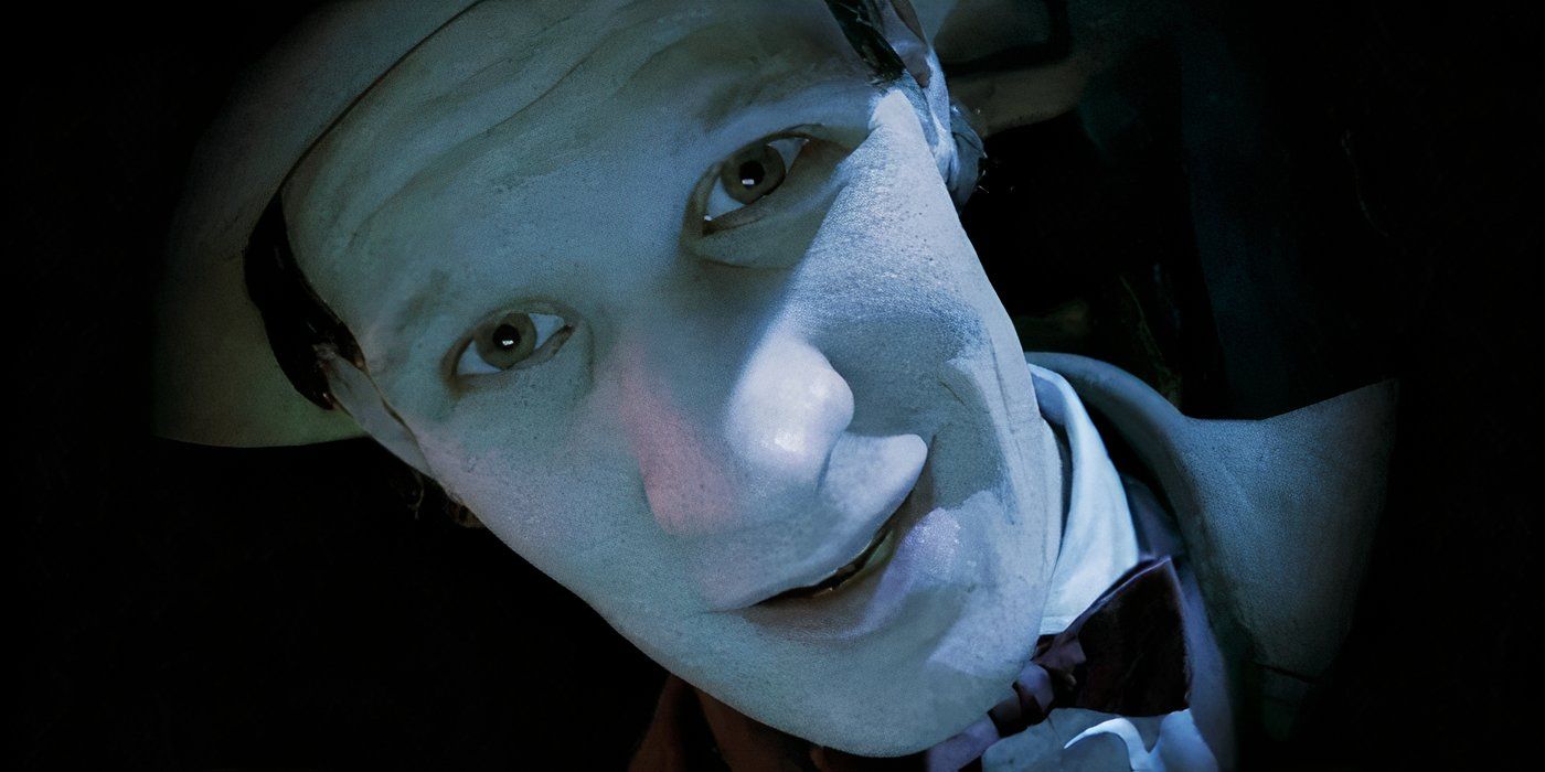 Matt Smith as the Eleventh Doctor peering at a dying Dalek in the Doctor Who episode "The Wedding of River Song."