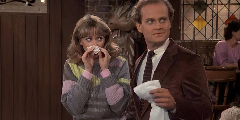 Frasier holding a tissue as Diane blows her nose in the Cheers episode "Diane's Allergy."