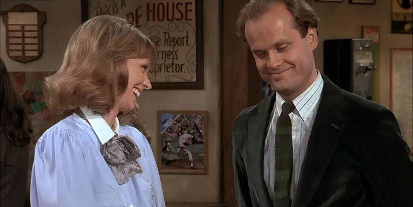 Frasier and Diane smiling at one another in the Cheers episode "Cheerio, Cheers."