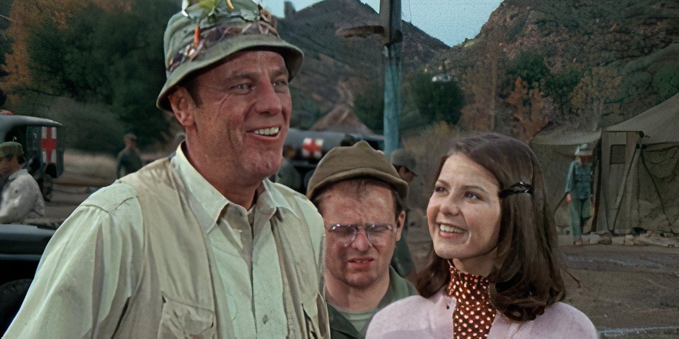 Radar looking awkward behind Nancy and Henry in the MASH episode "Henry in Love."