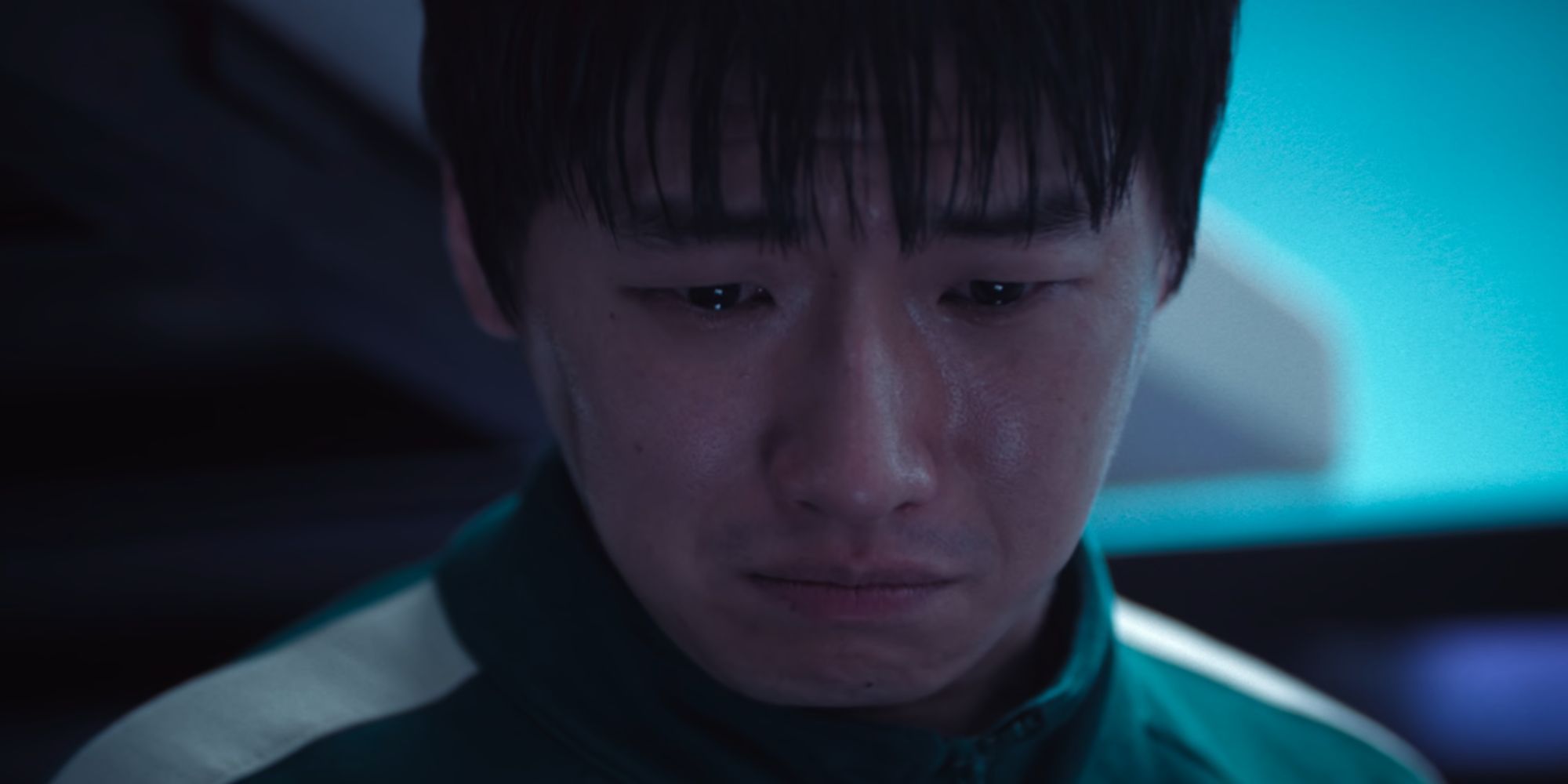 David Lee crying as Park Min-su in Squid Game