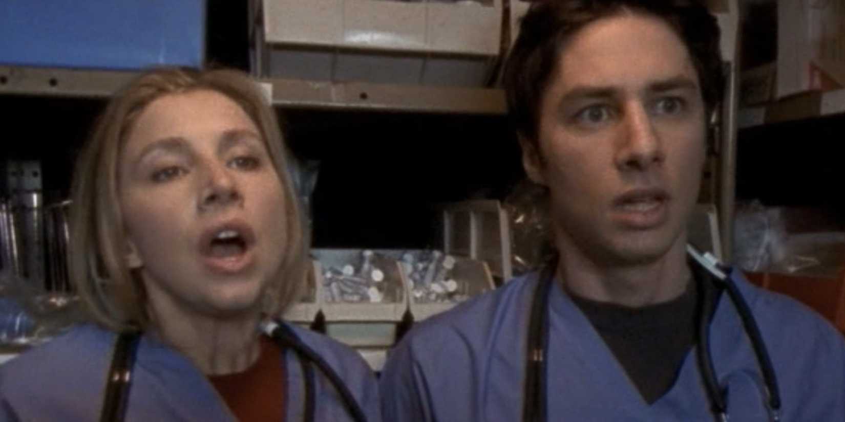 Sarah Chalke as Elliot Reid and Zach Braff as JD in Scrubs looking scared