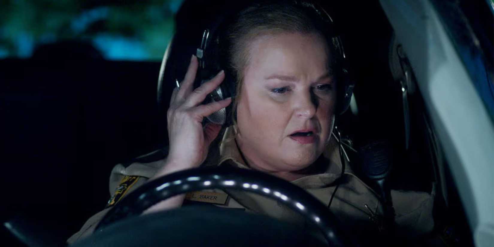 Elizabeth Bowden wearing headphones as Liv Baker in Resident Alien