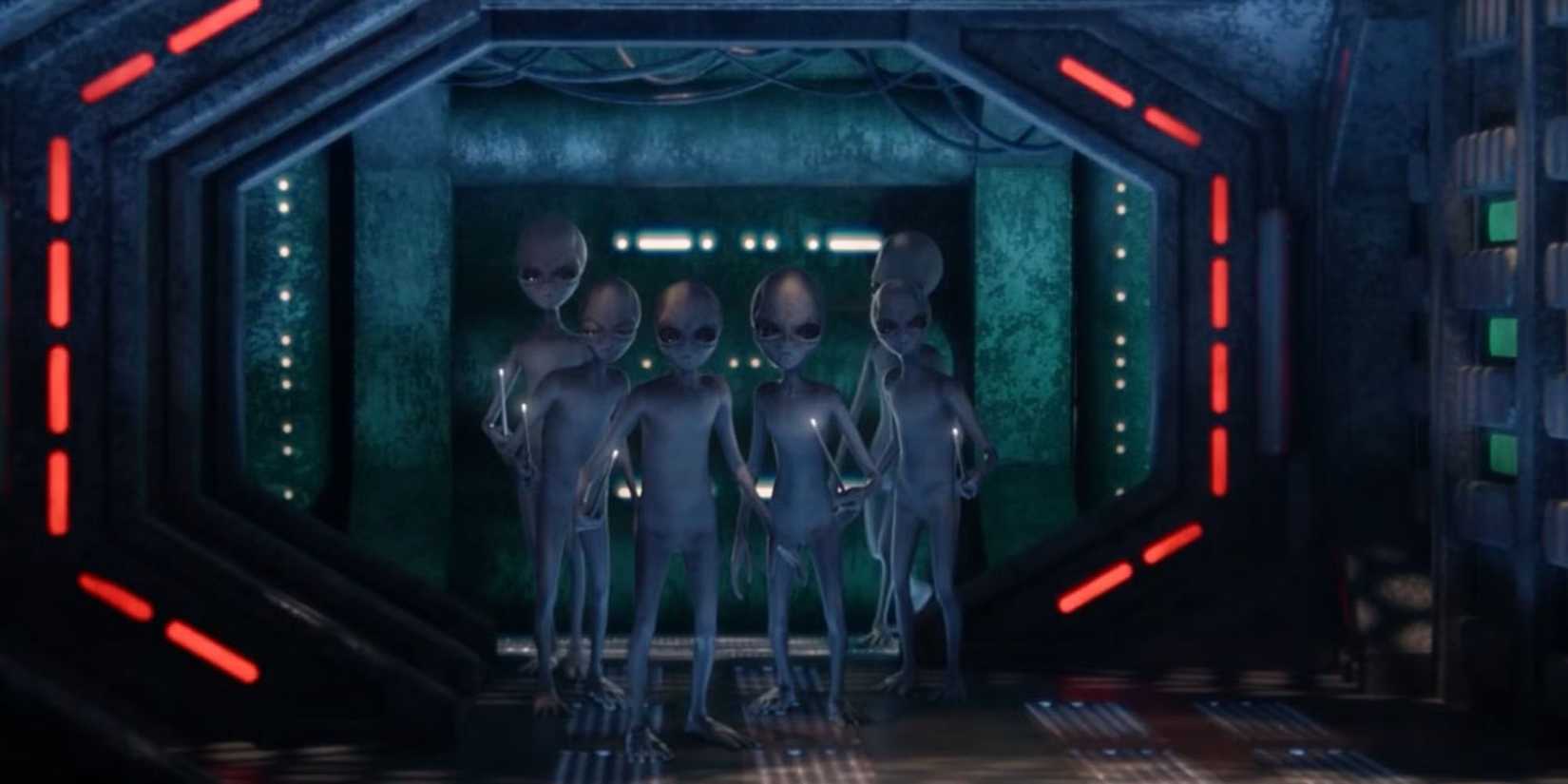 A group of Grey Aliens standing at the end of a hallway in Resident Alien