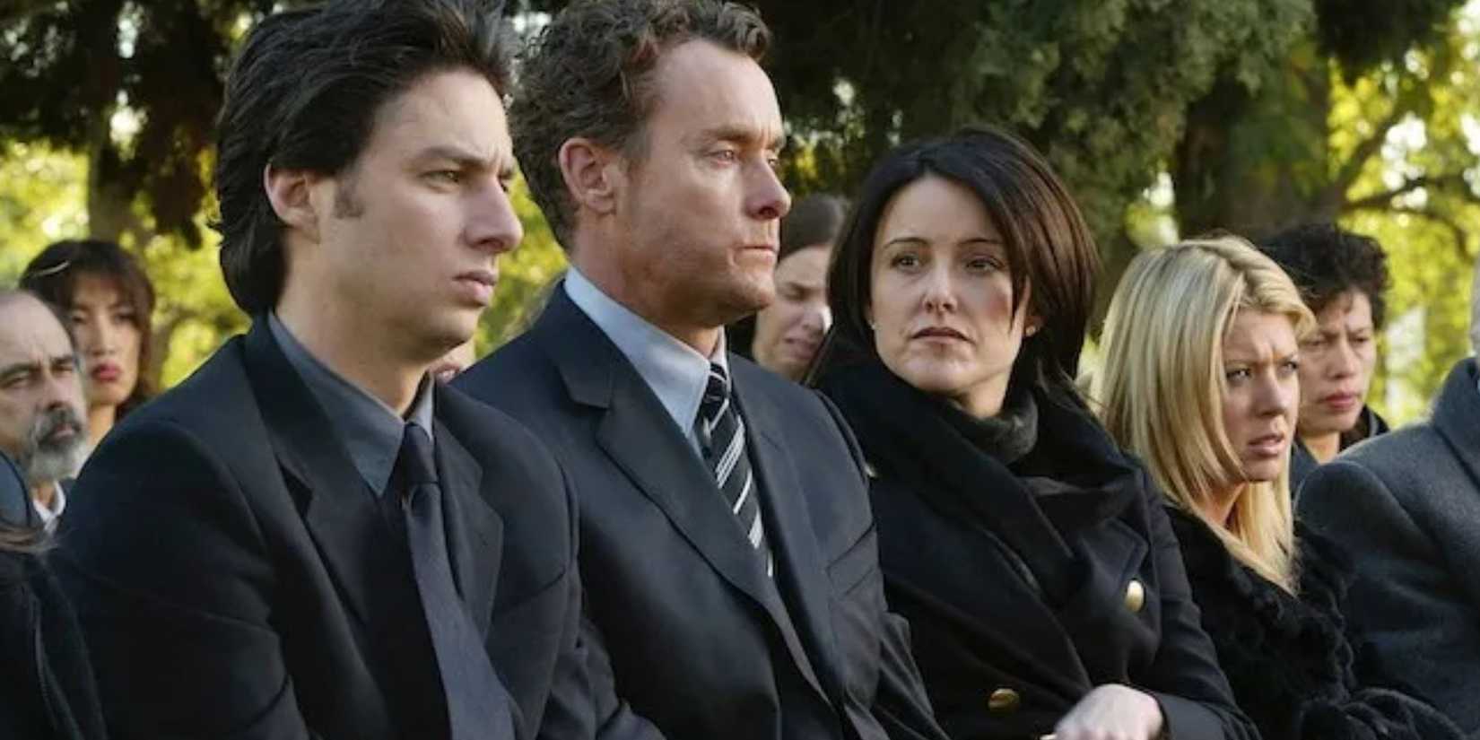 Dr. Cox at Ben's funeral in Scrubs with JD, Jordan, and Danni