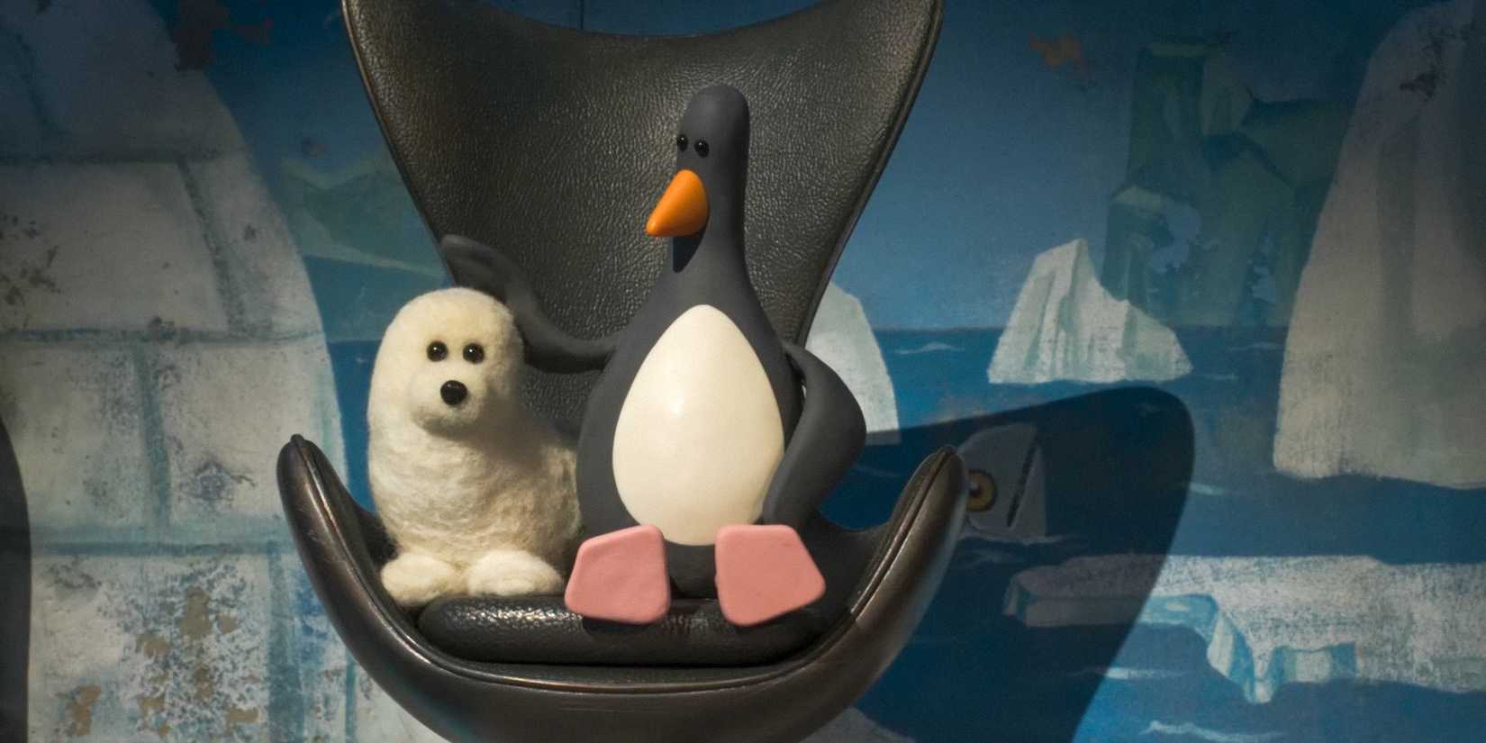 Feathers McGraw petting a baby seal in prison in Wallace & Gromit: Vengeance Most Fowl