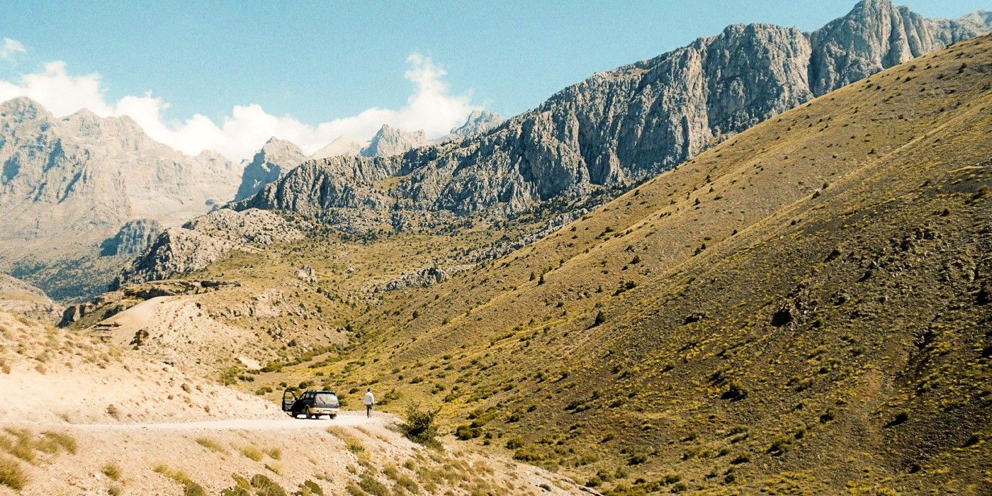 Large photo of there getting out of the car in the mountains in the things you kill 