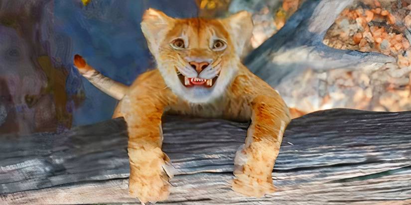Young Mufasa hanging from a tree branch in Mufasa The Lion King