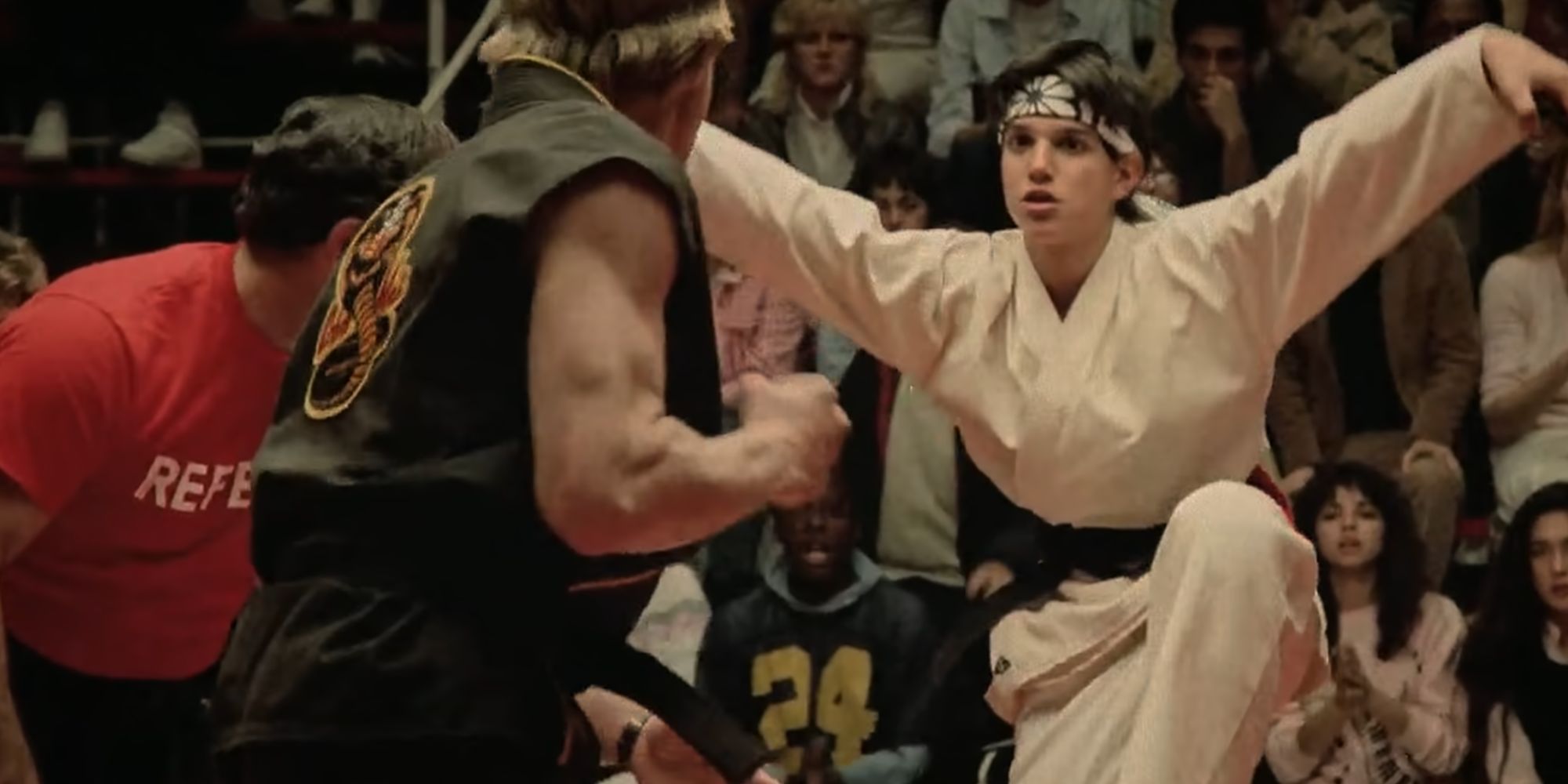 William Zabka as Johnny Lawrence in The Karate Kid about to fight with Ralph Macchio's Daniel LaRusso