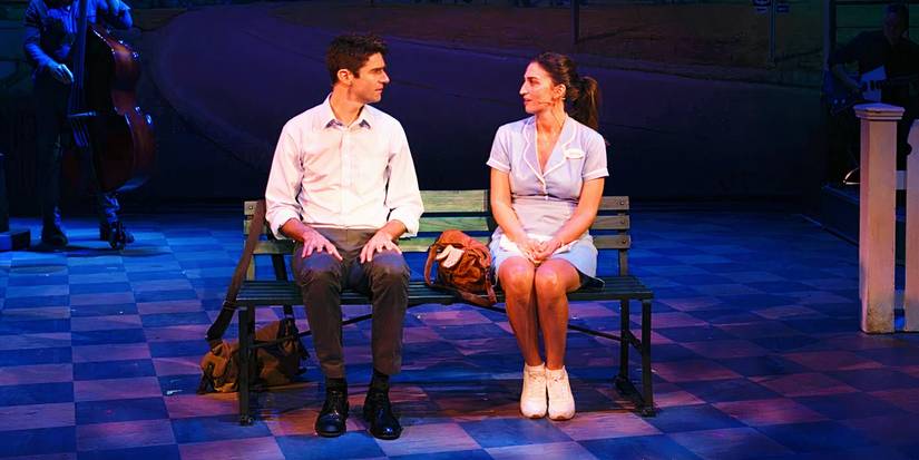 Sara Bareilles and Drew Gehling seated on bench in Waitress: The Musical