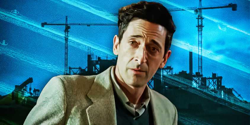 An edited image of Adrien Brody as Laszlo Toth in The Brutalist with cranes in the background.