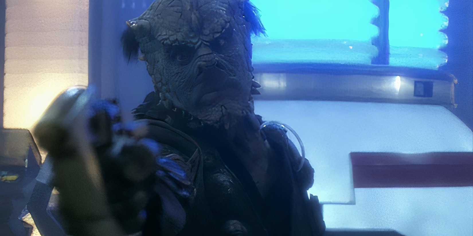 A Jem'Hadar soldier aims a phaser on the USS Defiant in DS9 One Little Ship