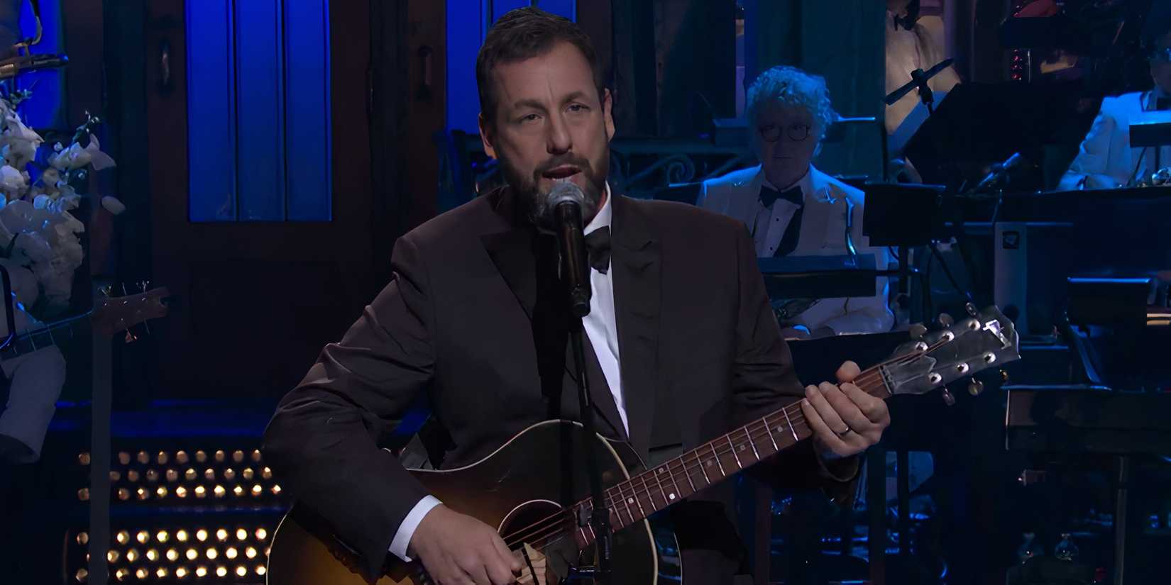 Adam Sandler performing "50 Years" during SNL 50