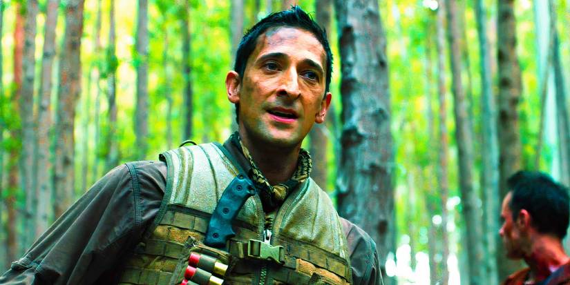 Adrien Brody in a forest as Royce in Predators