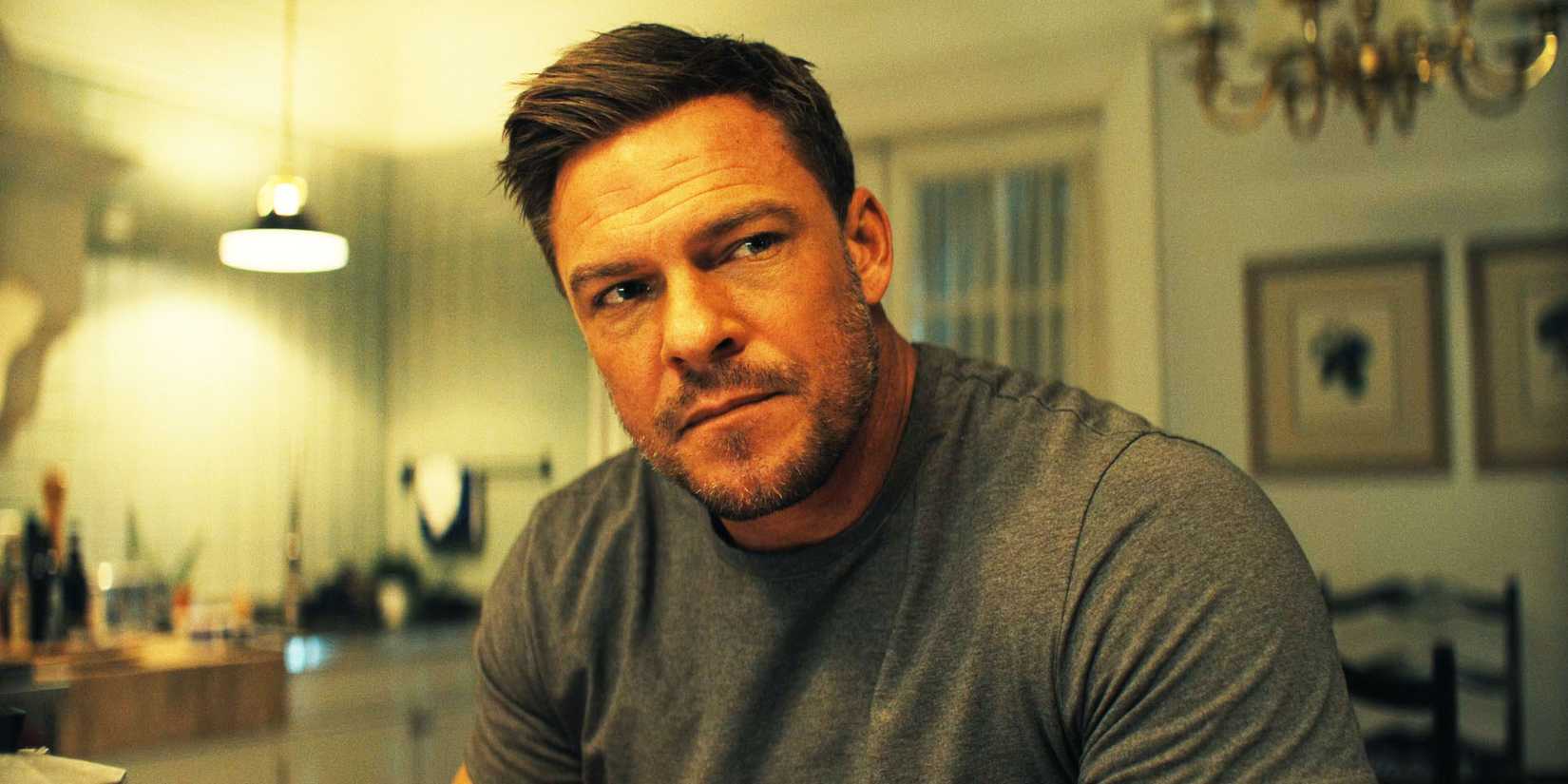 Alan Ritchson as Jack Reacher, in the kitchen, in Reacher season 2, episode 2