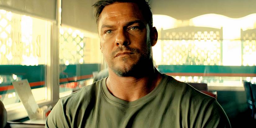 Alan Ritchson as Jack Reacher looking worried in Reacher season 3.