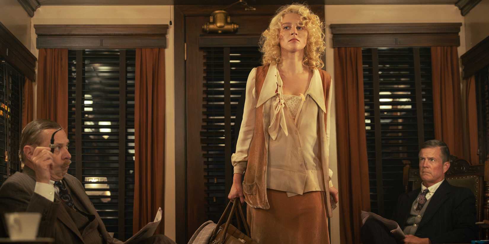 Alex walking into an office in 1923 season 2