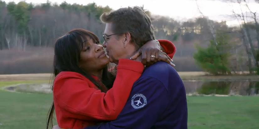Mina Mack and Mark Bessette in 90 Day Fiance kissing after meeting in U.S.