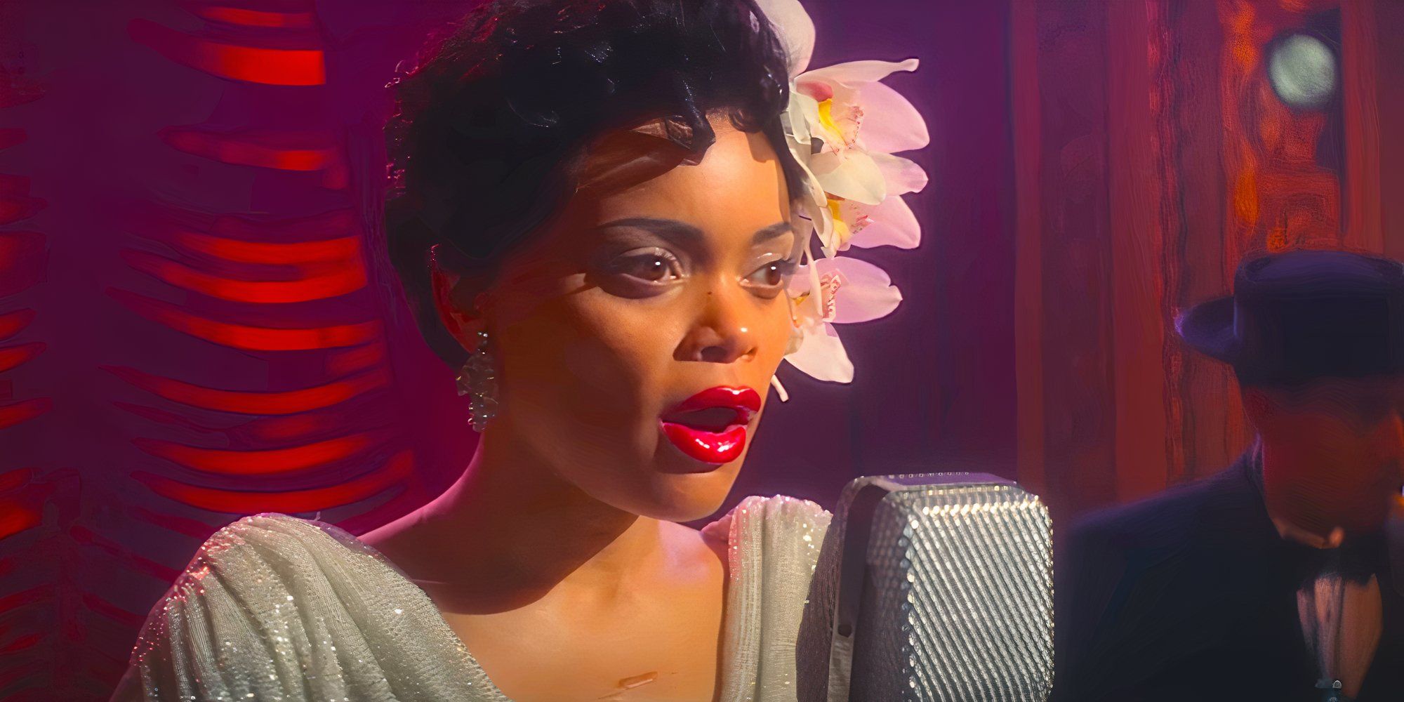 Andra Day sings on-stage in a scene from The United States vs. Billie Holiday