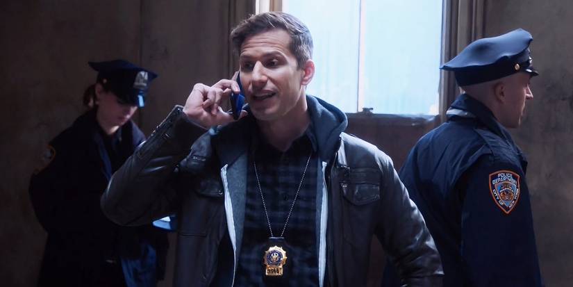 Andy Samberg as Jake Peraltam on the phone in Brooklyn Nine-Nine