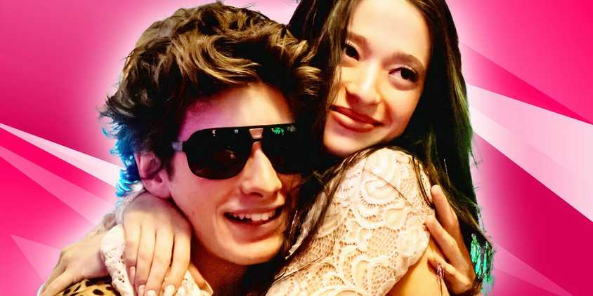 An edited image of Anora and Ivan in Anora with a pink background.
