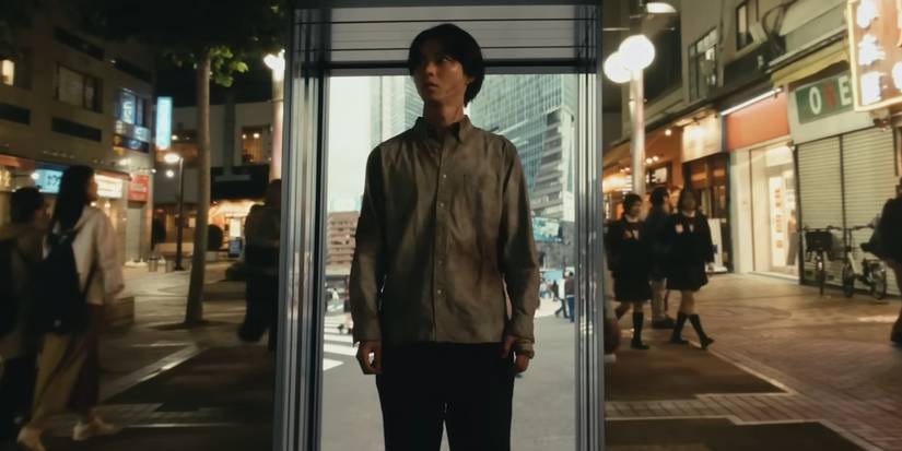 Arisu walking through a portal in Alice in Borderland season 3
