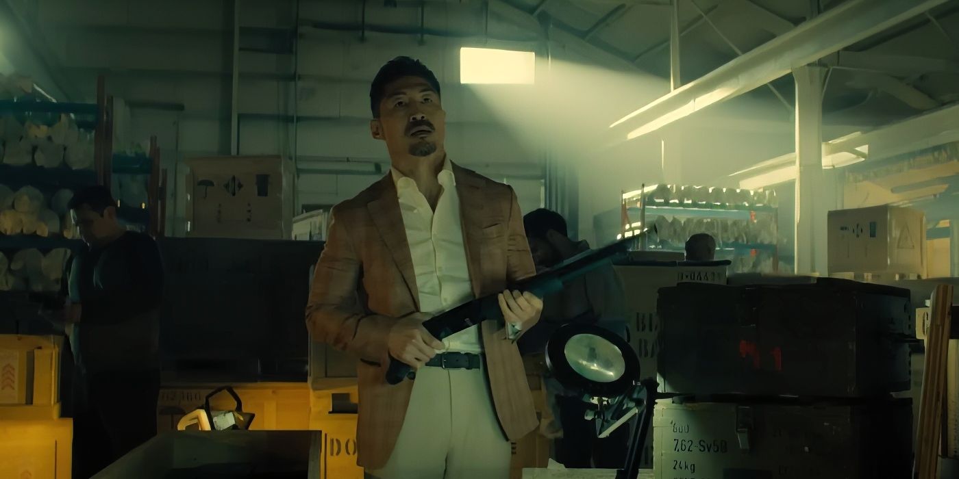 Brian Tee as Quinn with a shotgun in Reacher's third season