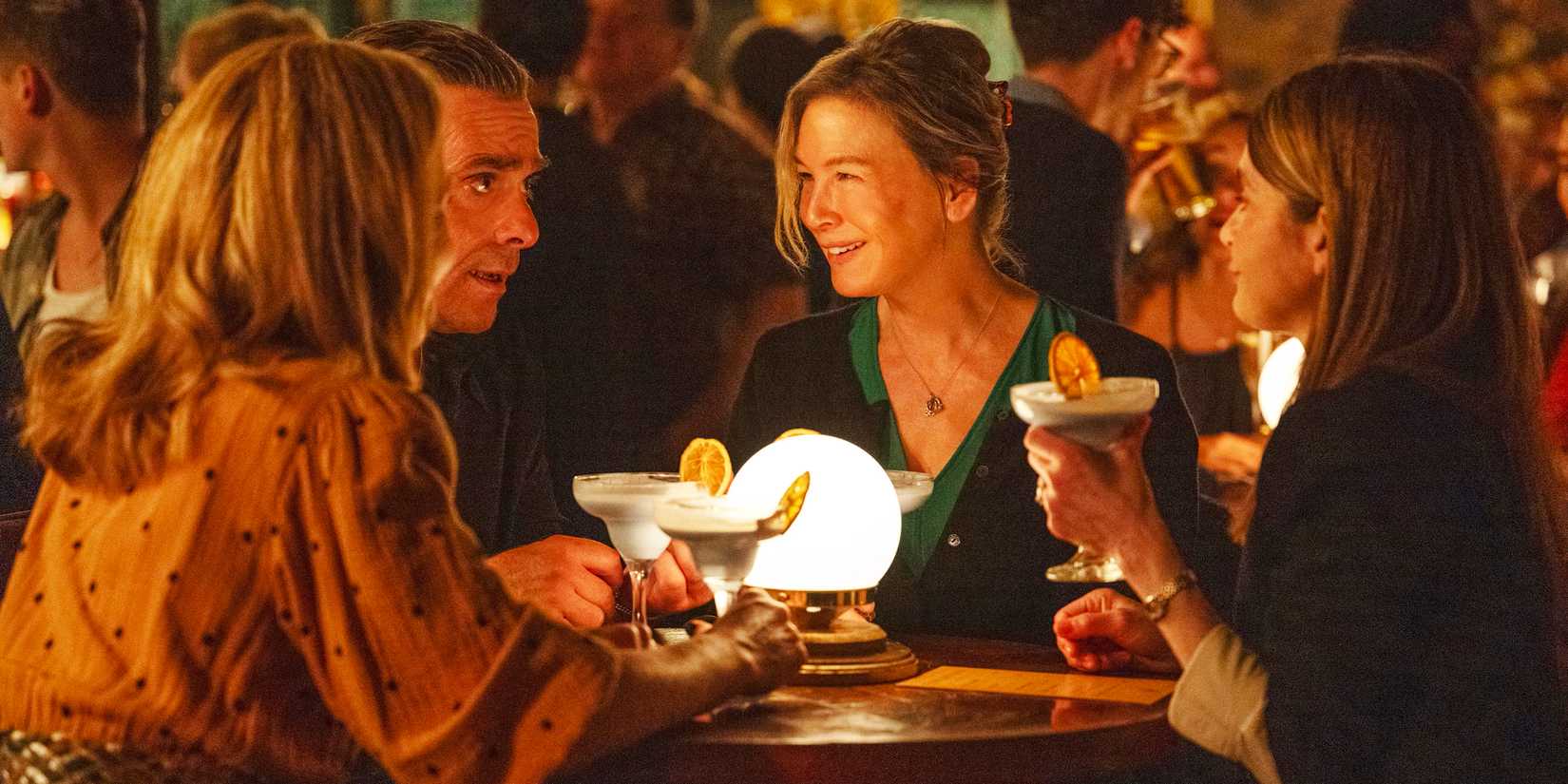 Bridget Jones Mad About the Boy Bridget and friends at a bar