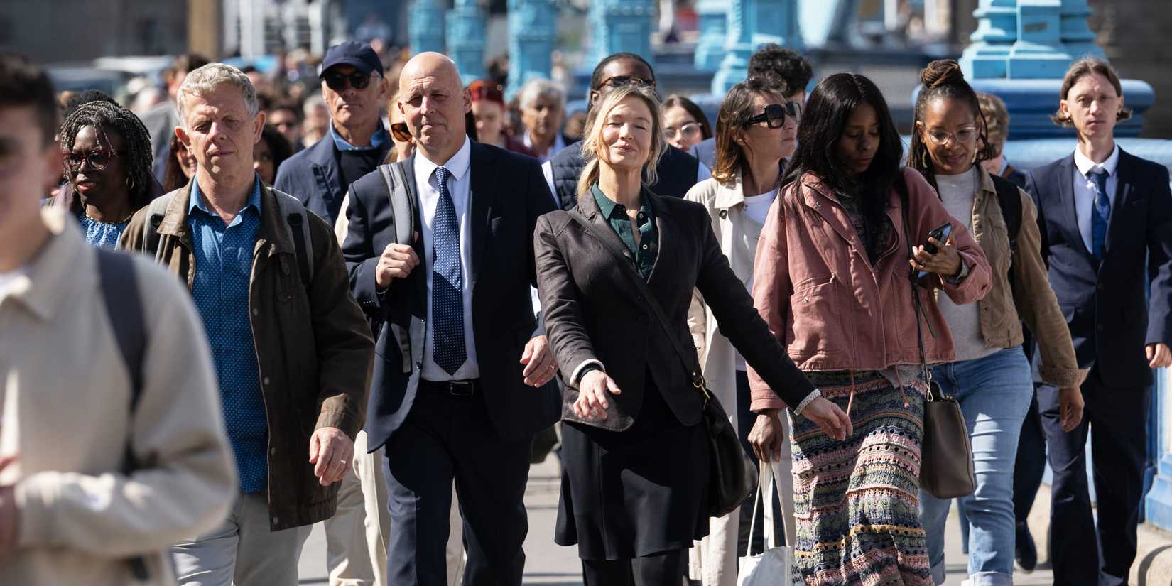 Bridget Jones Mad About the Boy Bridget walking happy