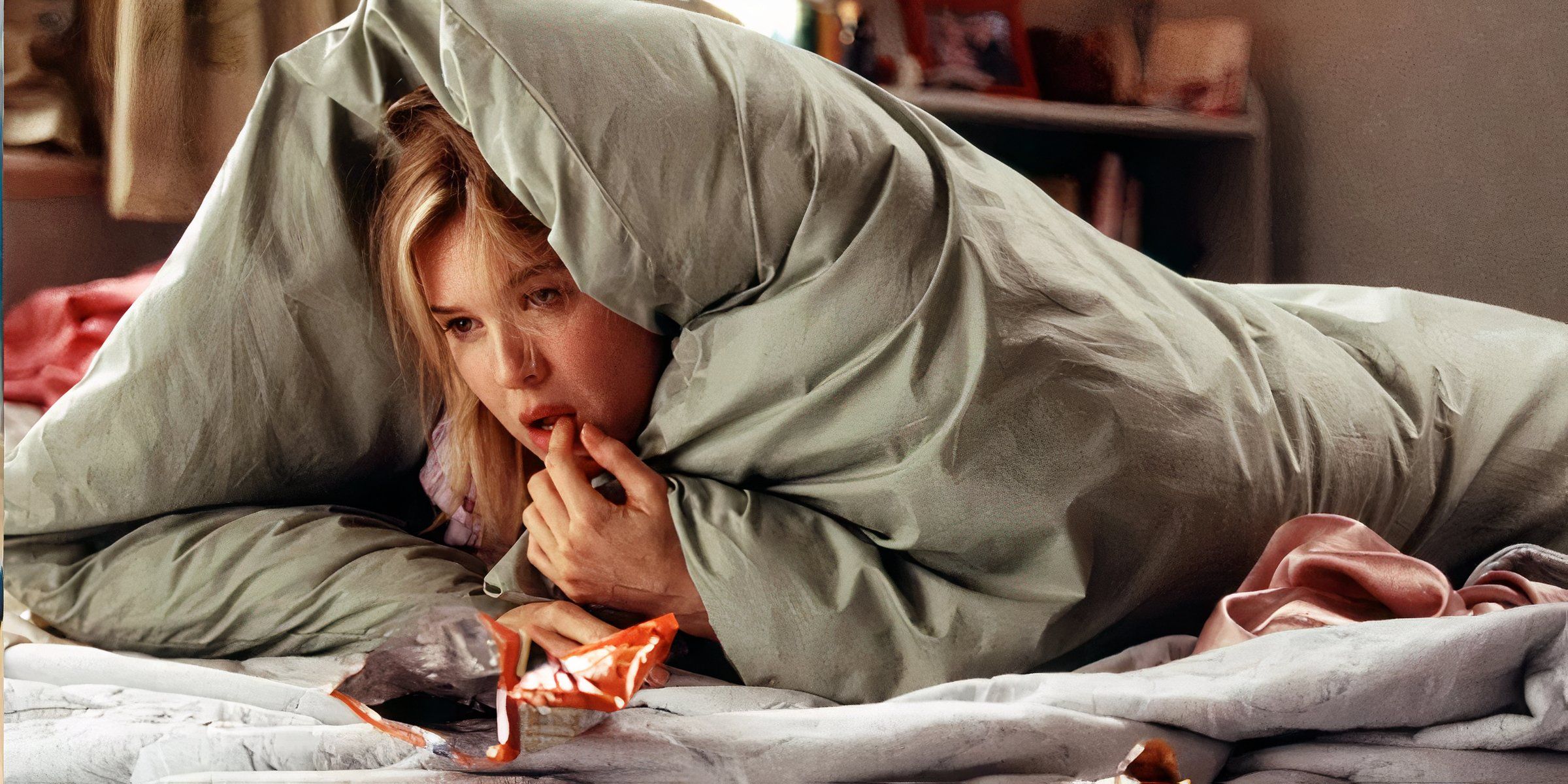 Renee Zellweger under a bed cover in Bridget Jones's Diary