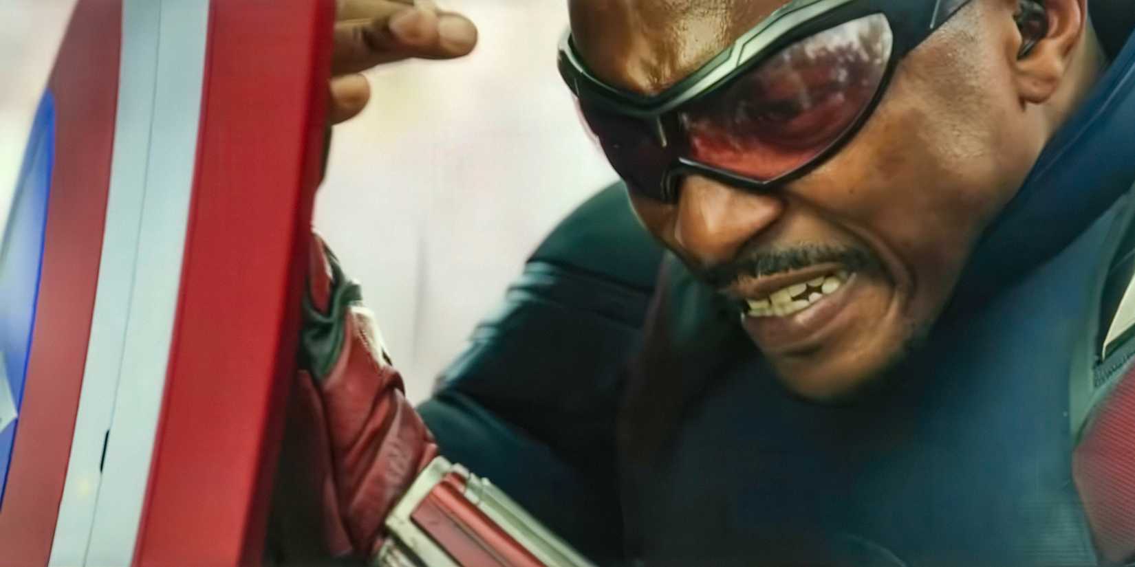 Sam Wilson hides behind his shield in Captain America Brave New World