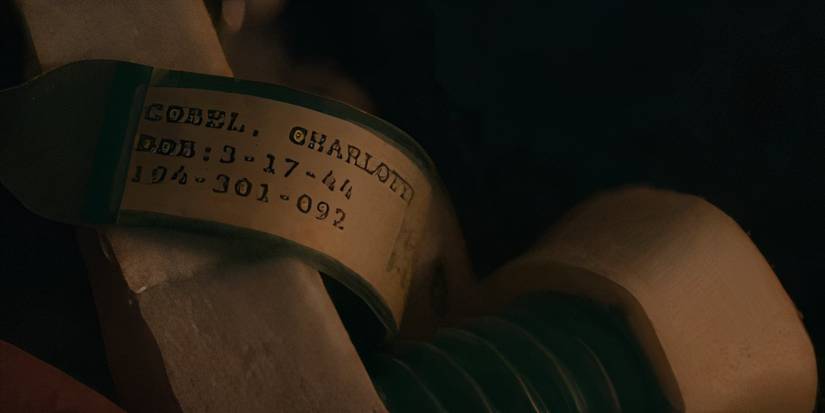 A hospital tag in Severance season 1 (2022) reading the name "Charlotte Cobel" above a date