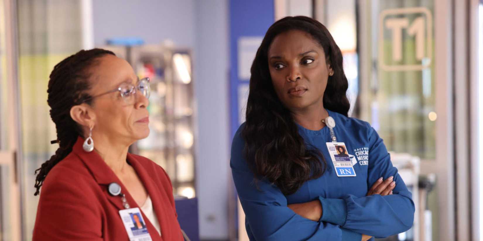 Chicago Med Maggie crossing her arms and glaring while standing next to Sharon