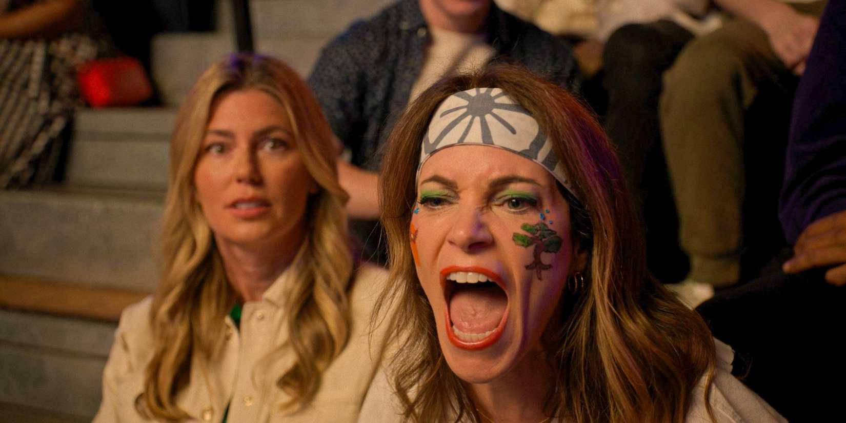 Amanda (Courtney Henggeler) with great enthusiasm supporting Miyagi-Do in Cobra Kai Season 6 Ep 13