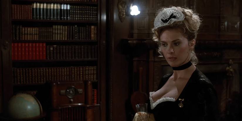 Colleen Camp as Yvette cleaning in Clue